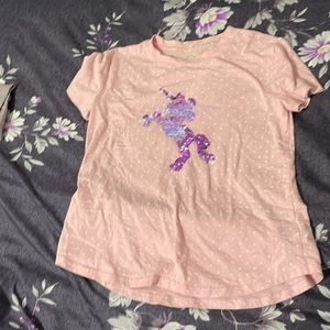 I am selling a pink T-shirt from wonder nation it has a unicorn sequins, dots